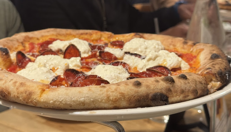 Sunnyside Pizzeria signature dishes Hot Honey Char PizzaPepperoni PizzaLemon Pepper Chicken Wings
